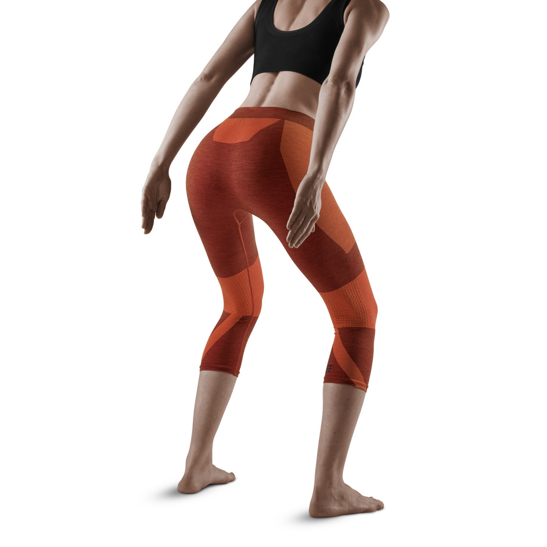 Meia-calça base 3/4 para esqui, mulher, laranja - modelo com vista traseira