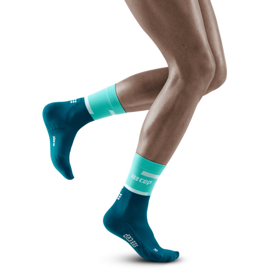 The run calcetines de compresión de corte medio 4.0, mujeres, océano