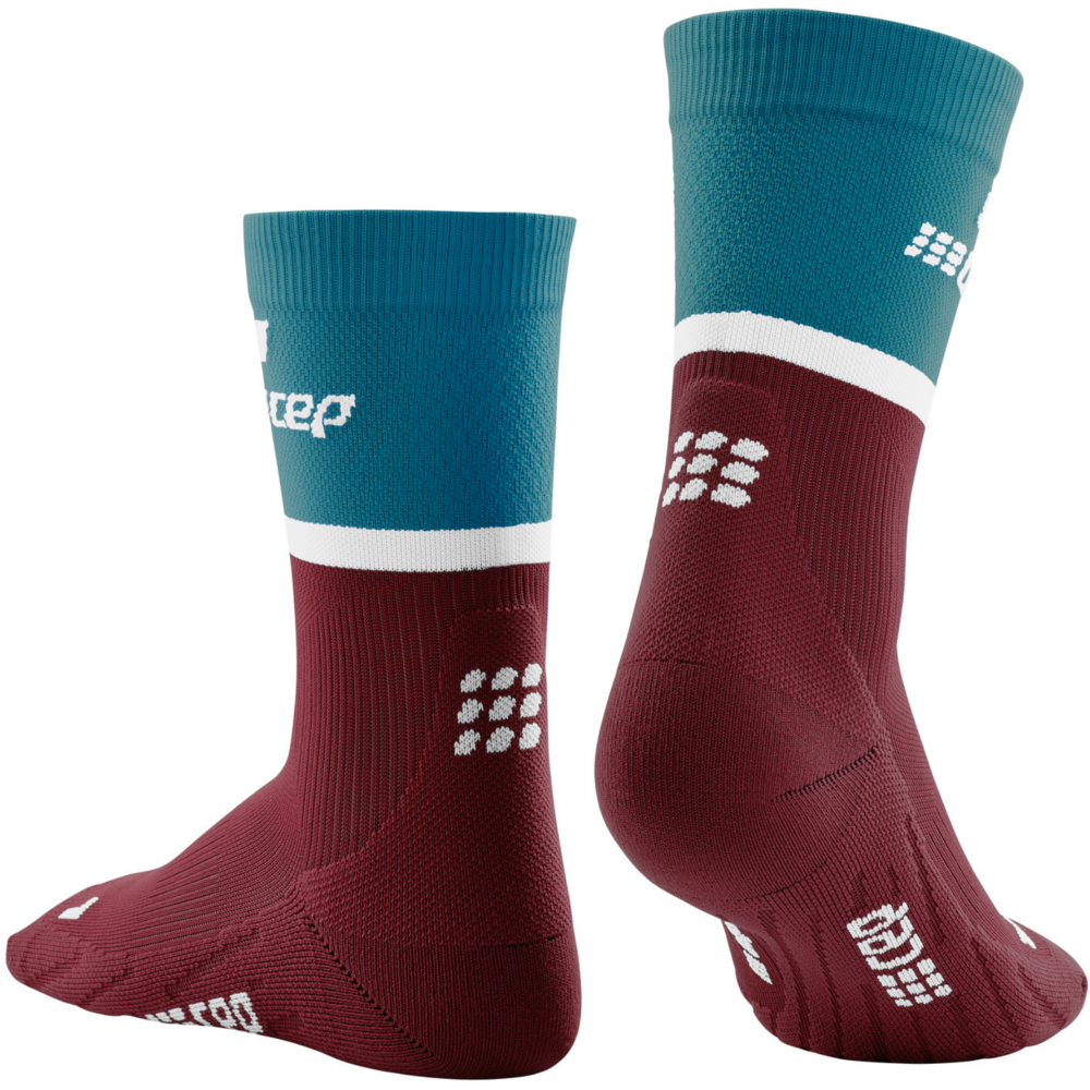 The run calcetines de compresión media caña 4.0, hombre, petróleo/rojo oscuro, vista posterior