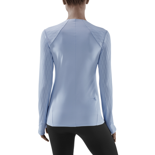 Camisa para el frío, mujer, azul claro, modelo vista de espaldas