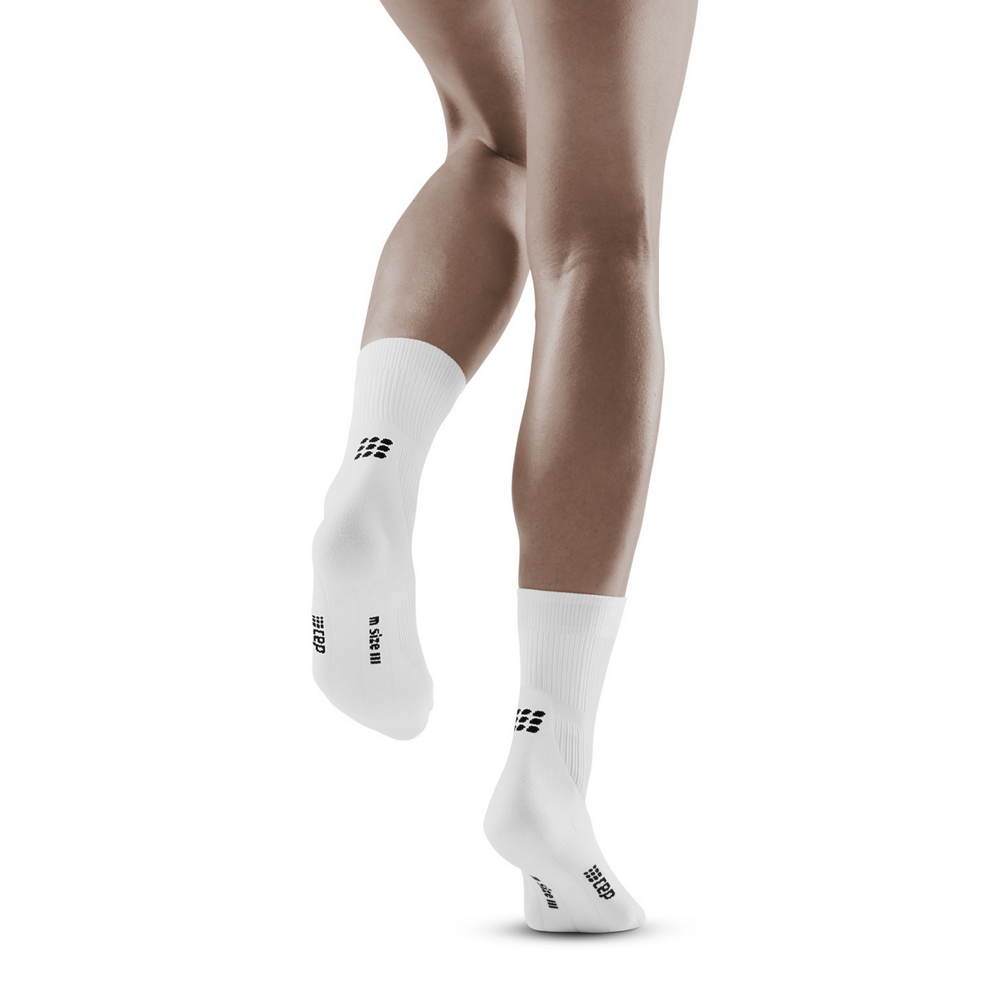 Κλασικές κάλτσες συμπίεσης μέσης κοπής, γυναικείες, λευκές, μοντέλο οπίσθιας όψης