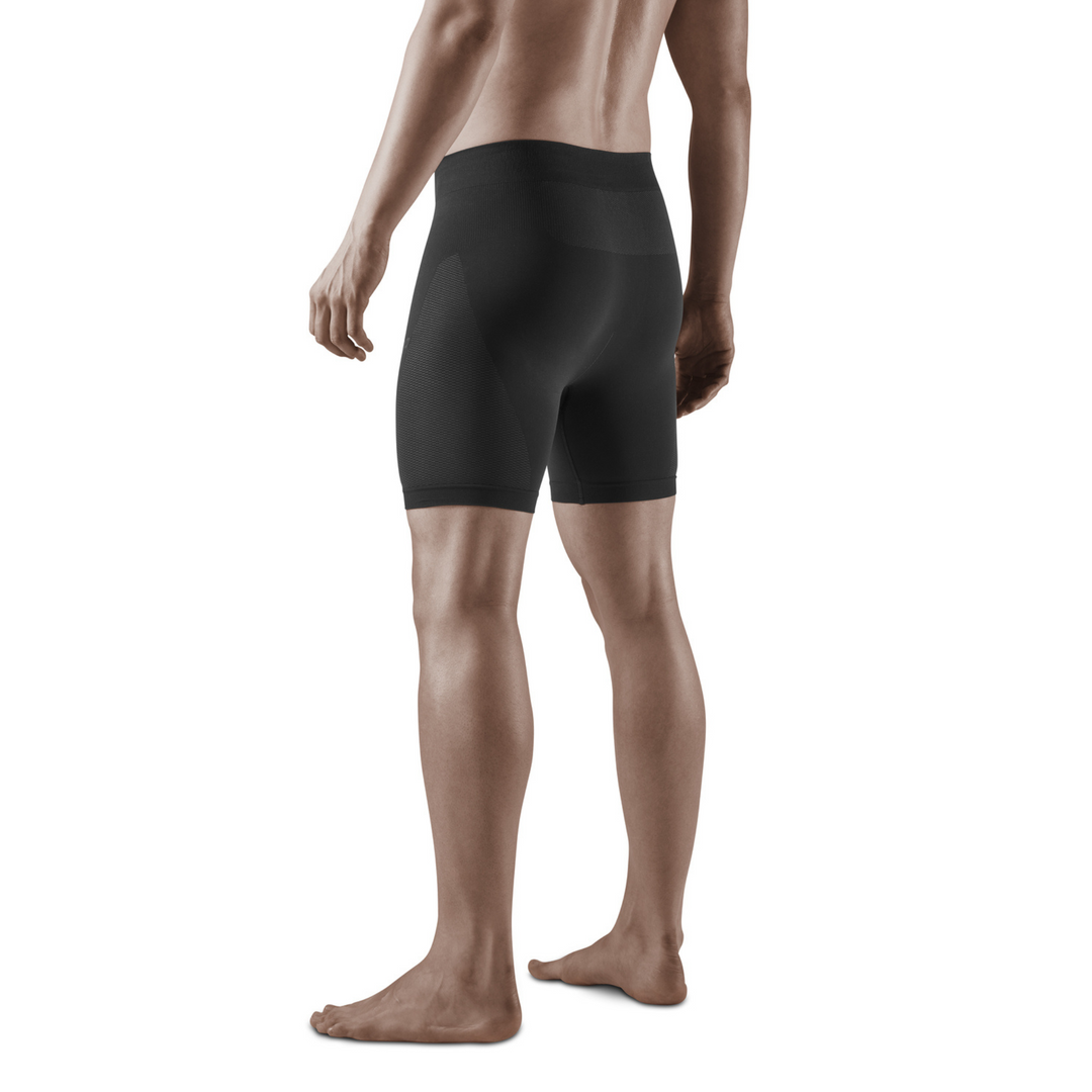 Pantalón corto base para clima frío, hombres, negro, modelo vista de espaldas