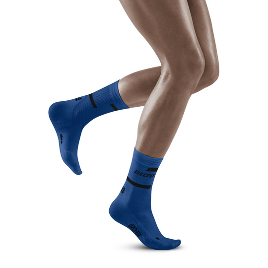 The run calcetines de compresión de corte medio 4.0, mujeres, azul/negro