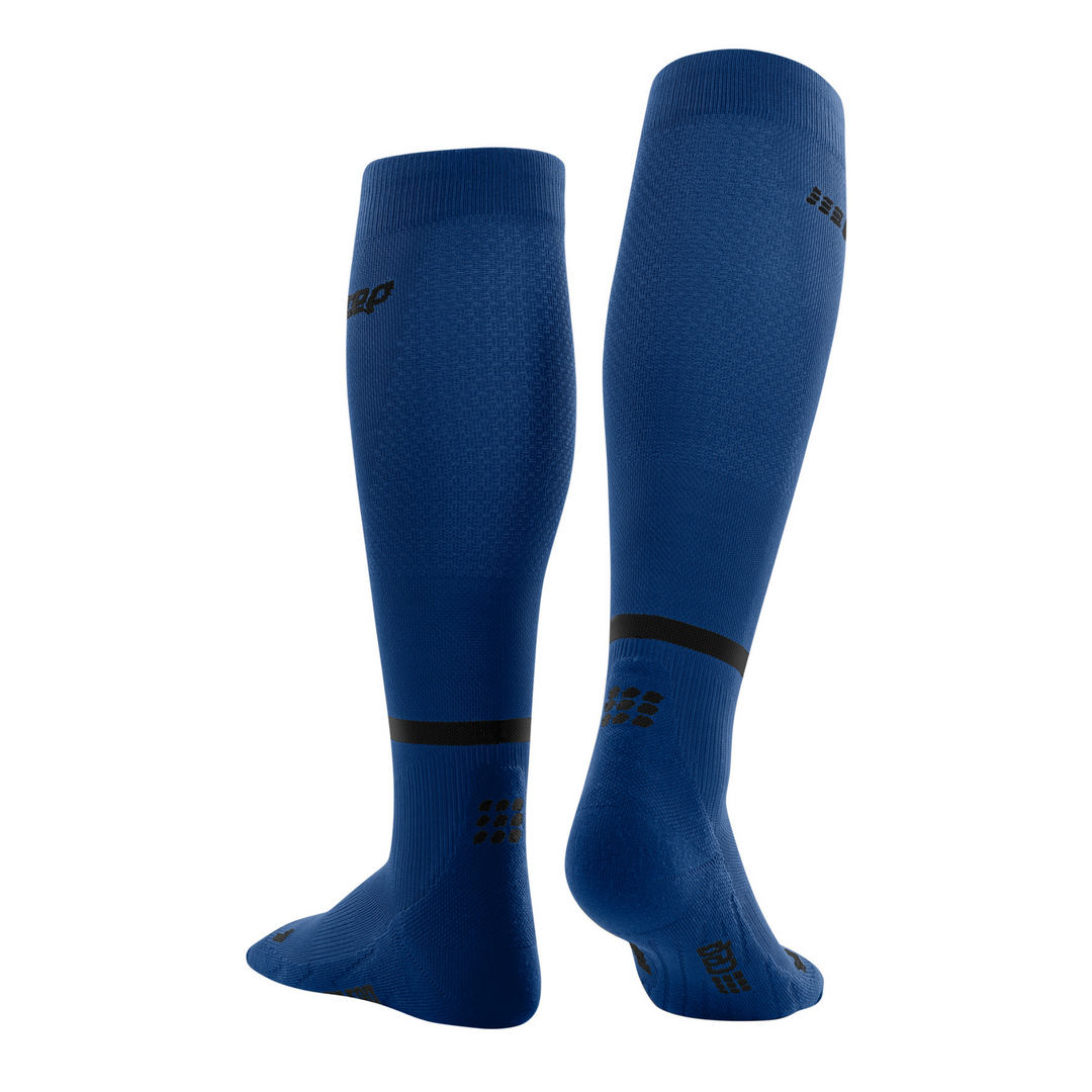 The run calcetines altos de compresión 4.0, mujeres, azul/negro, vista posterior