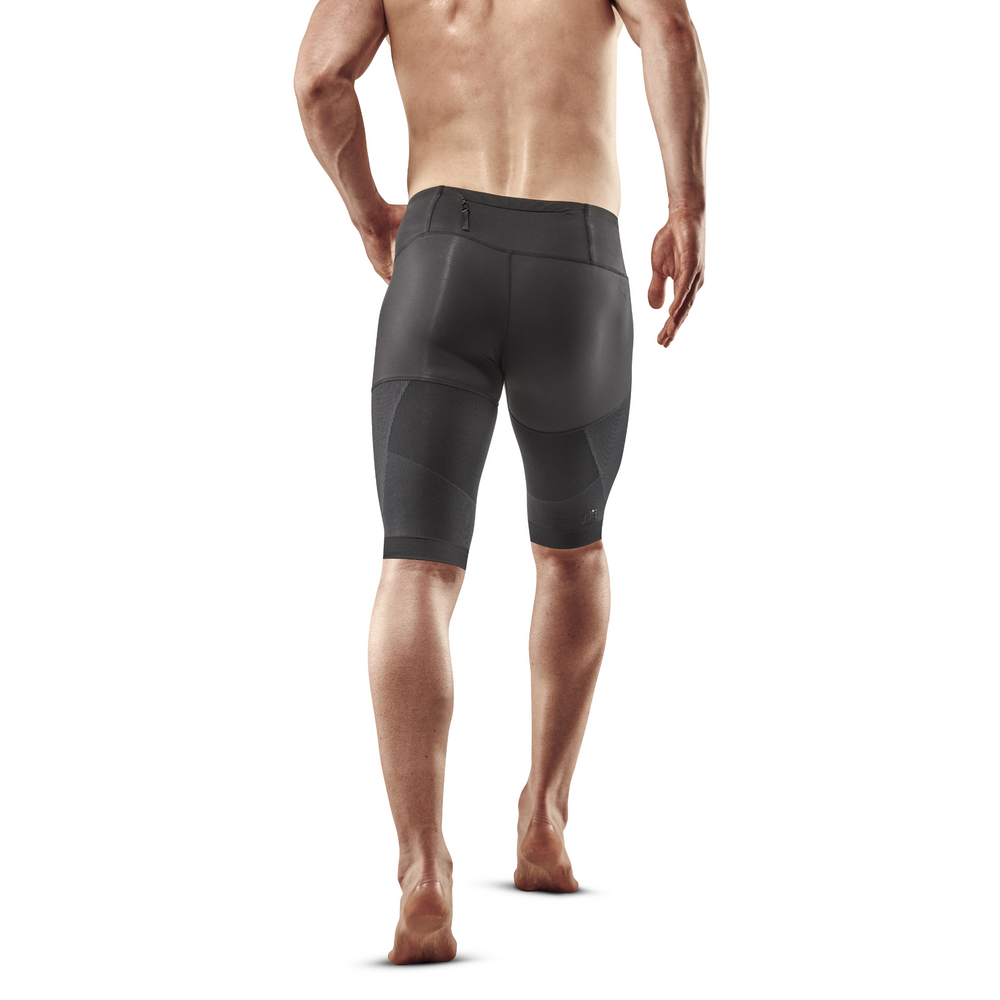 Pantalón corto de compresión para correr 4.0, hombre, modelo con vista trasera