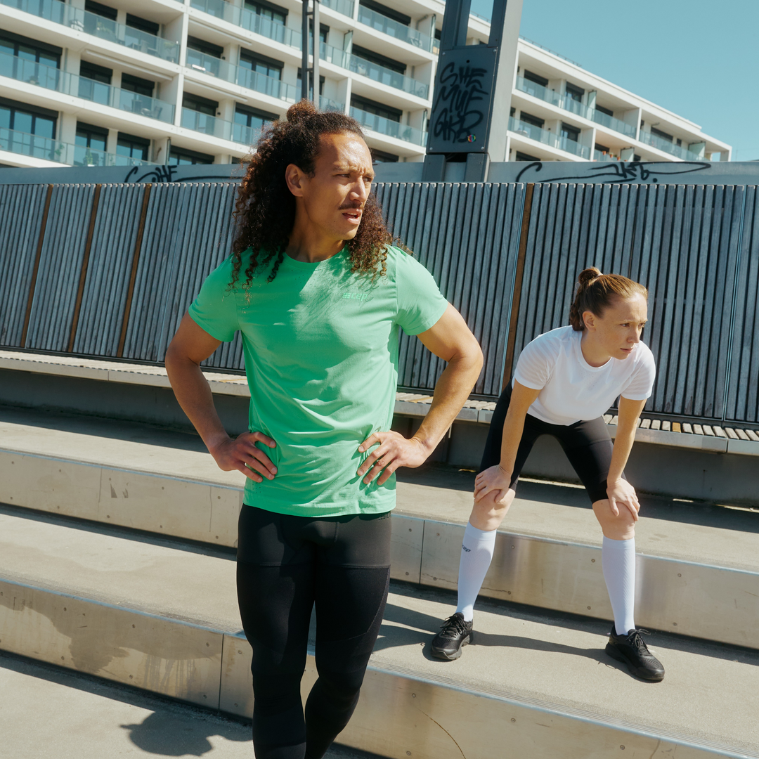 Green running tights sales mens