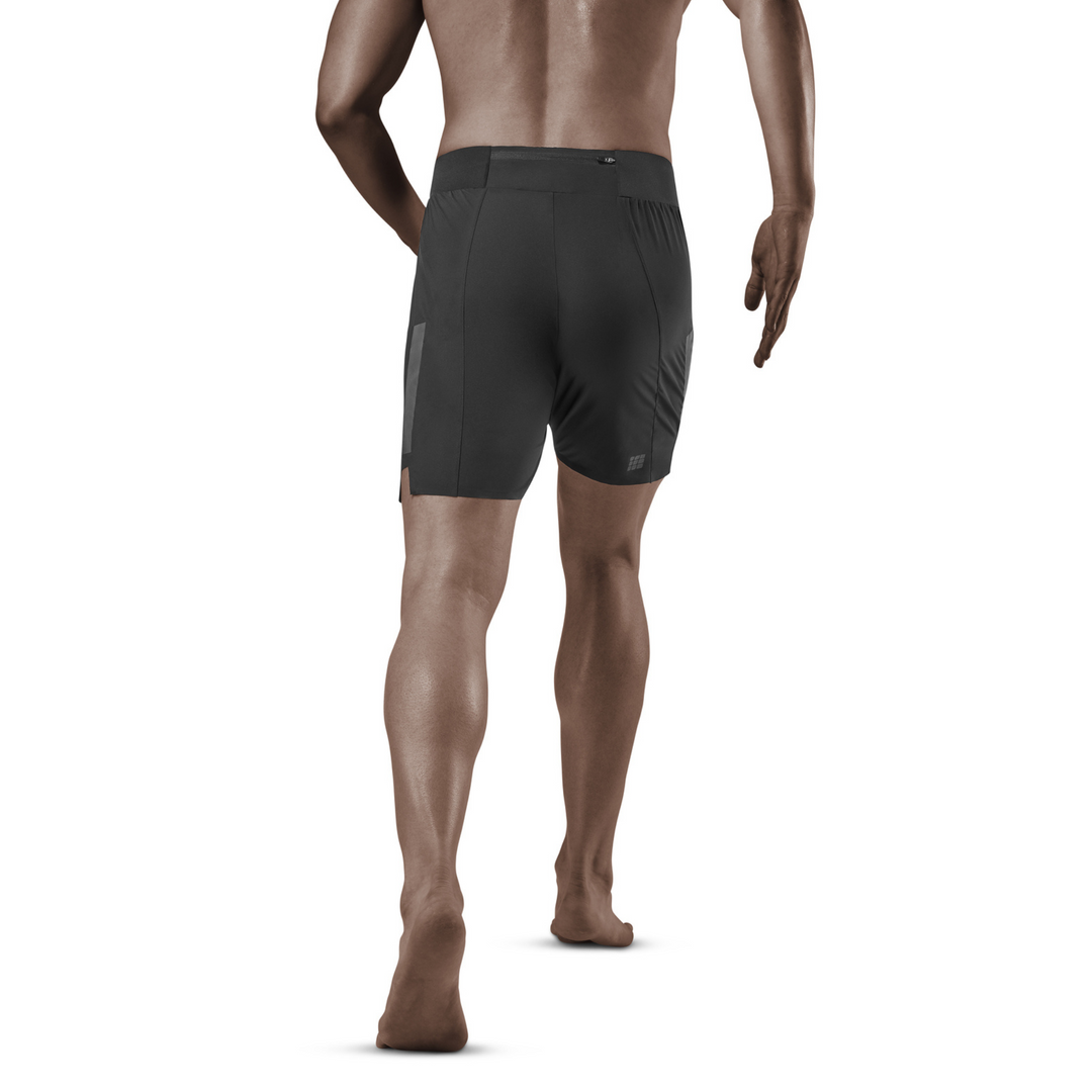 Shorts Run Loose Fit, masculino, preto, modelo com vista traseira