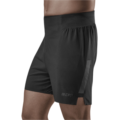 Run Loose Fit Shorts, Men, Black, Side View Model