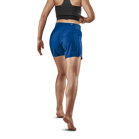 Shorts Run Loose Fit, feminino, azul, modelo com vista traseira