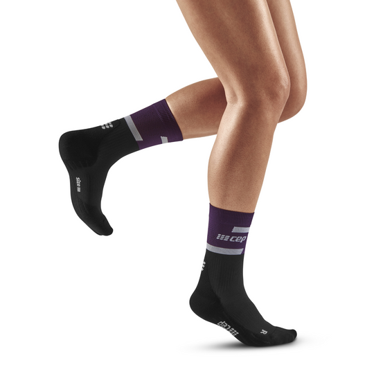 The run calcetines de compresión de corte medio 4.0, mujeres, violeta/negro