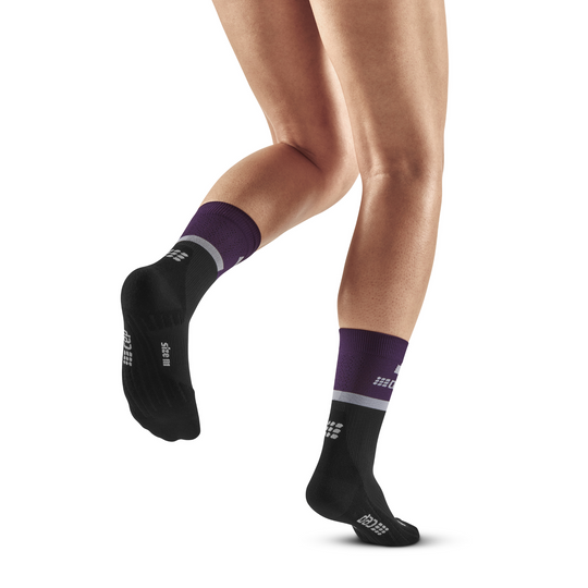 The run calcetines de compresión media caña 4.0, mujer, violeta/negro, modelo vista trasera