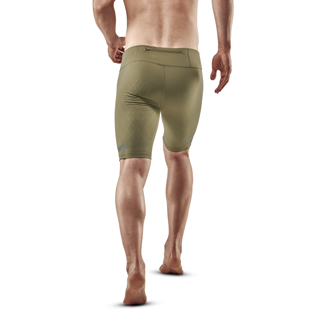 Pantalón corto The run support, hombre, verde oliva, modelo vista trasera