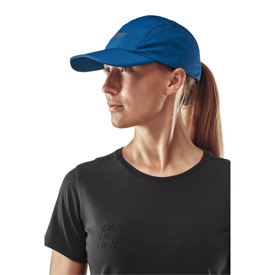 Gorra Run, azul, modelo vista lateral, mujer