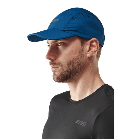 Gorra Run, azul, modelo vista lateral, hombre